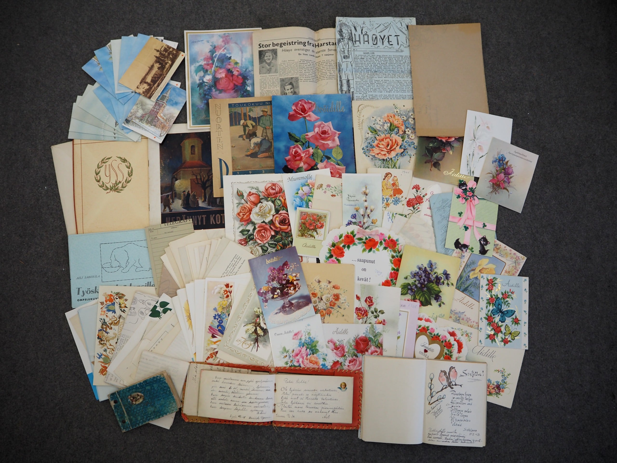 Postikortit ym.