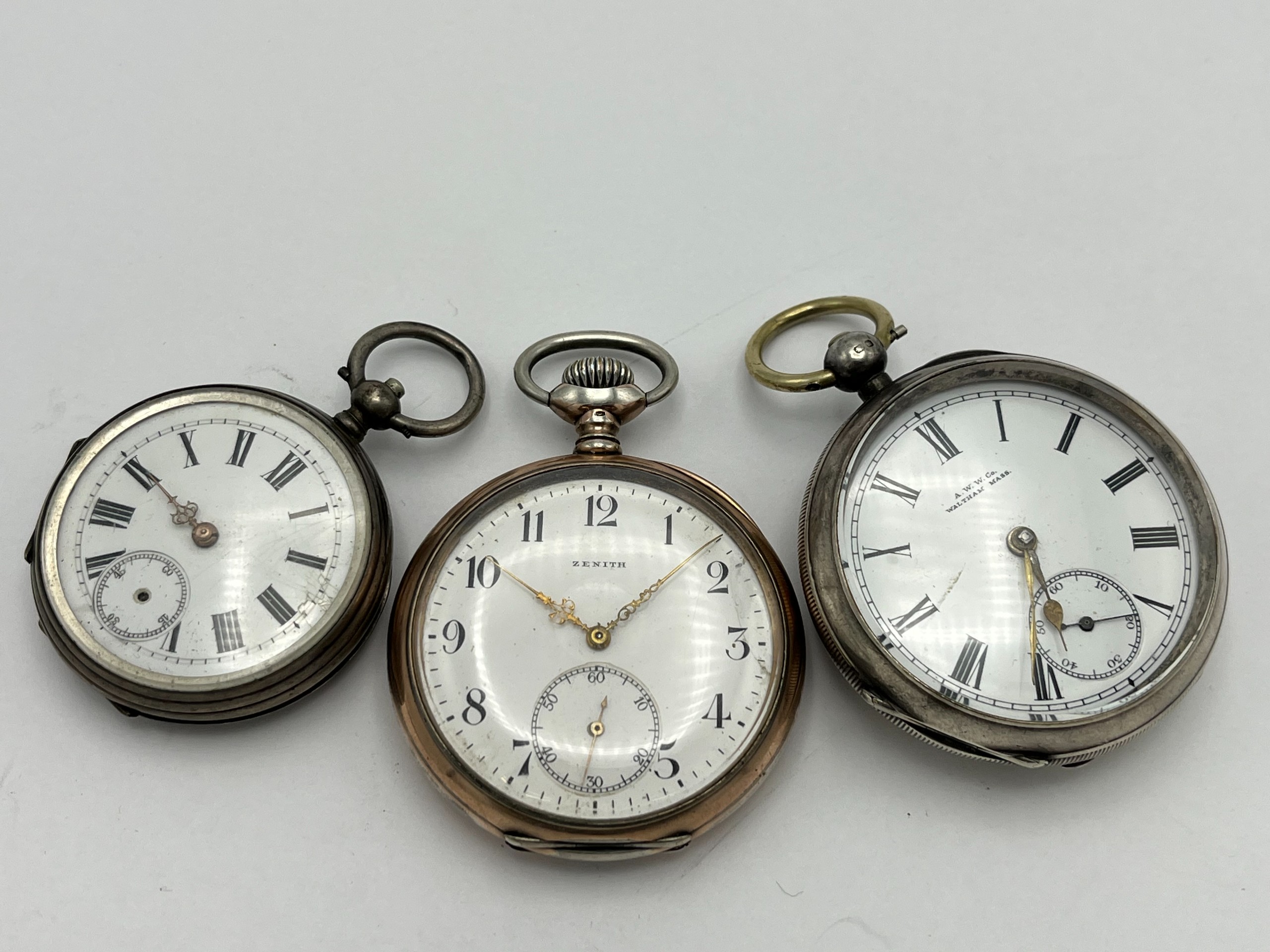 Hopeiset taskukellot Zenith ym - Huutokauppa Ekman