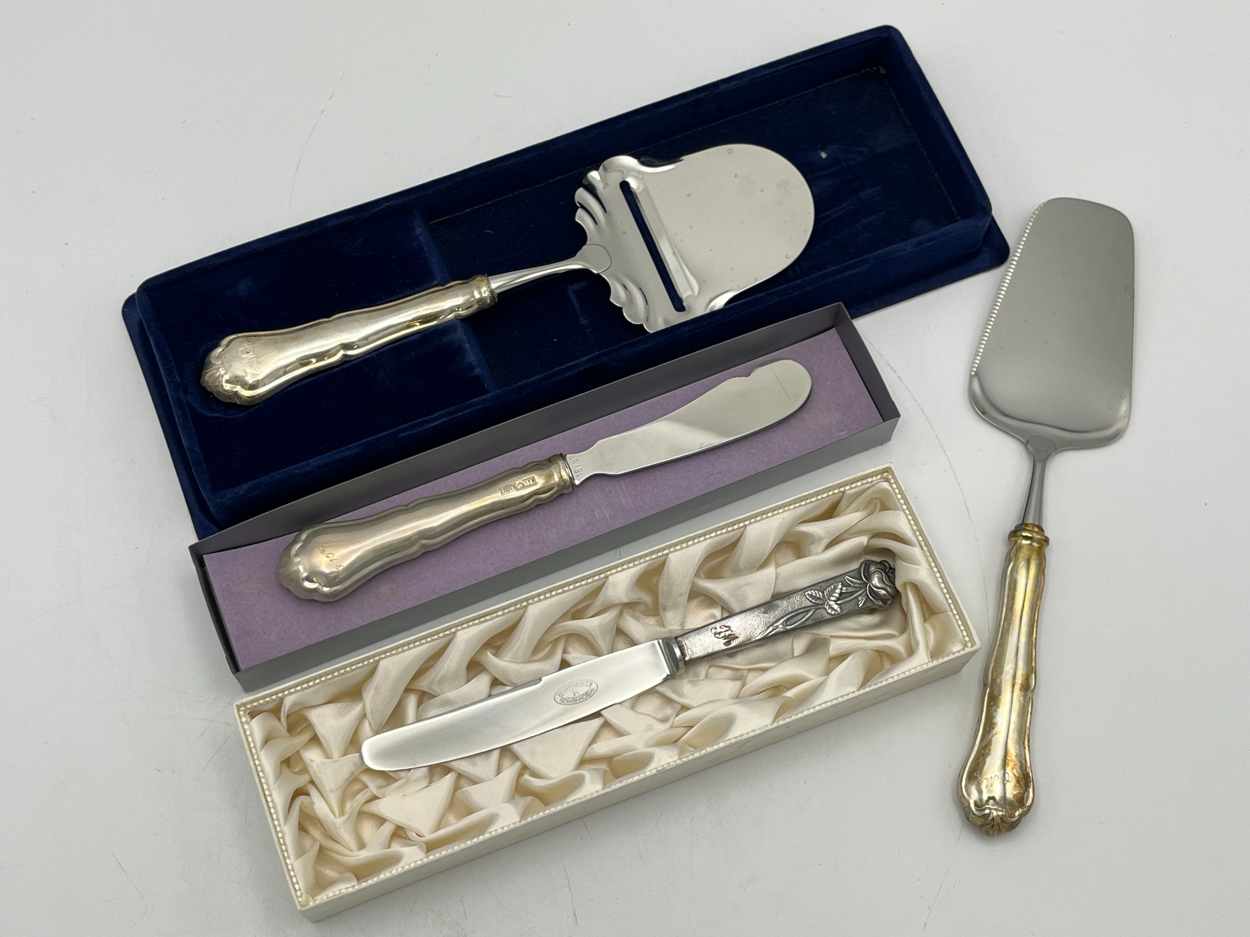 Hopeiset ottimet - Huutokauppa Ekman