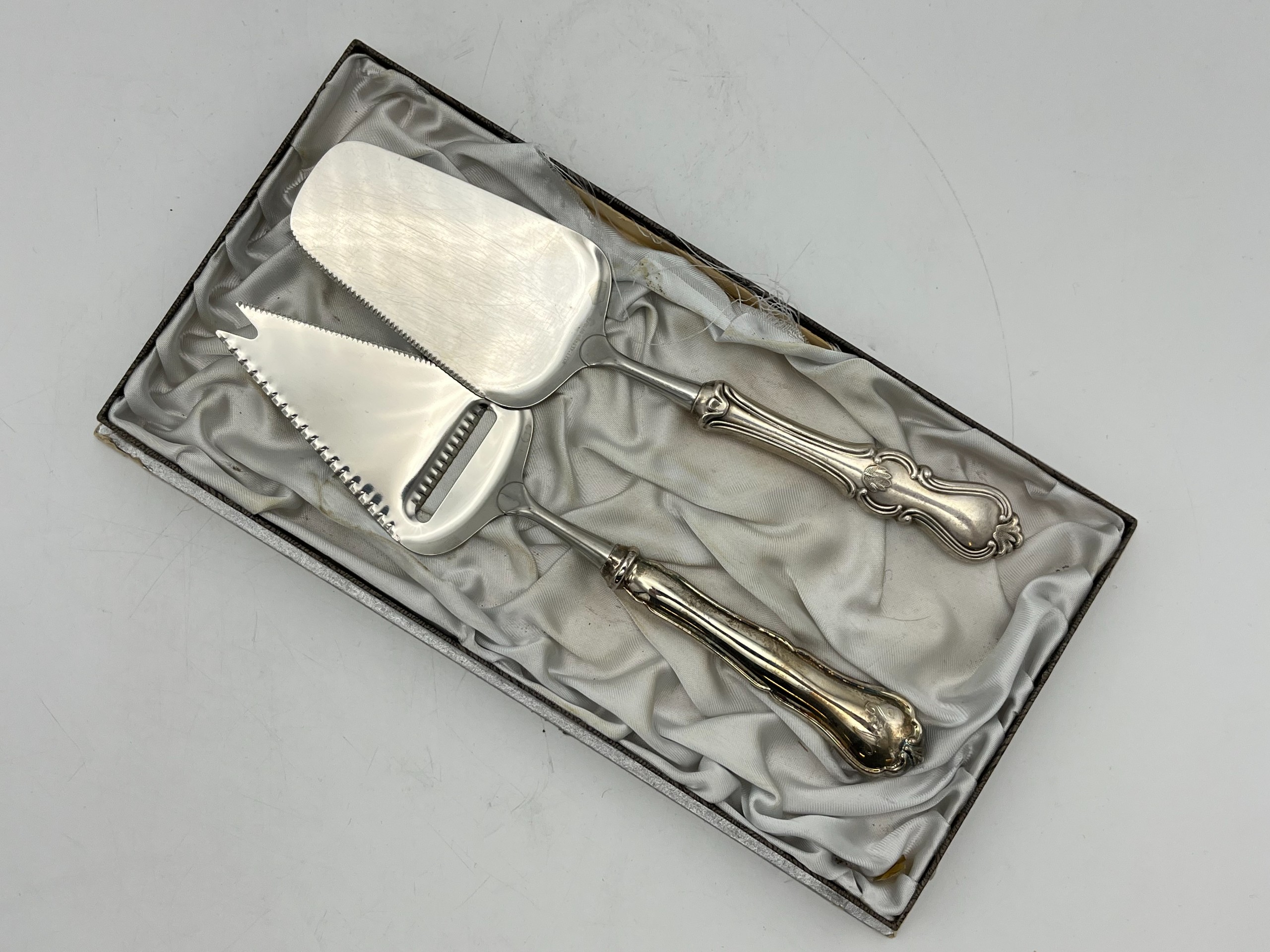 Hopeiset ottimet - Huutokauppa Ekman