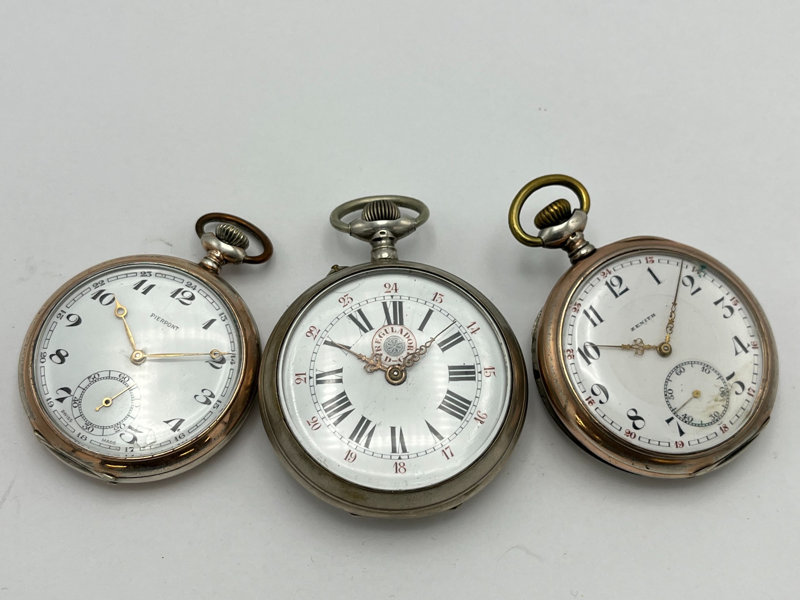 Hopeiset taskukellot Zenith ym - Huutokauppa Ekman