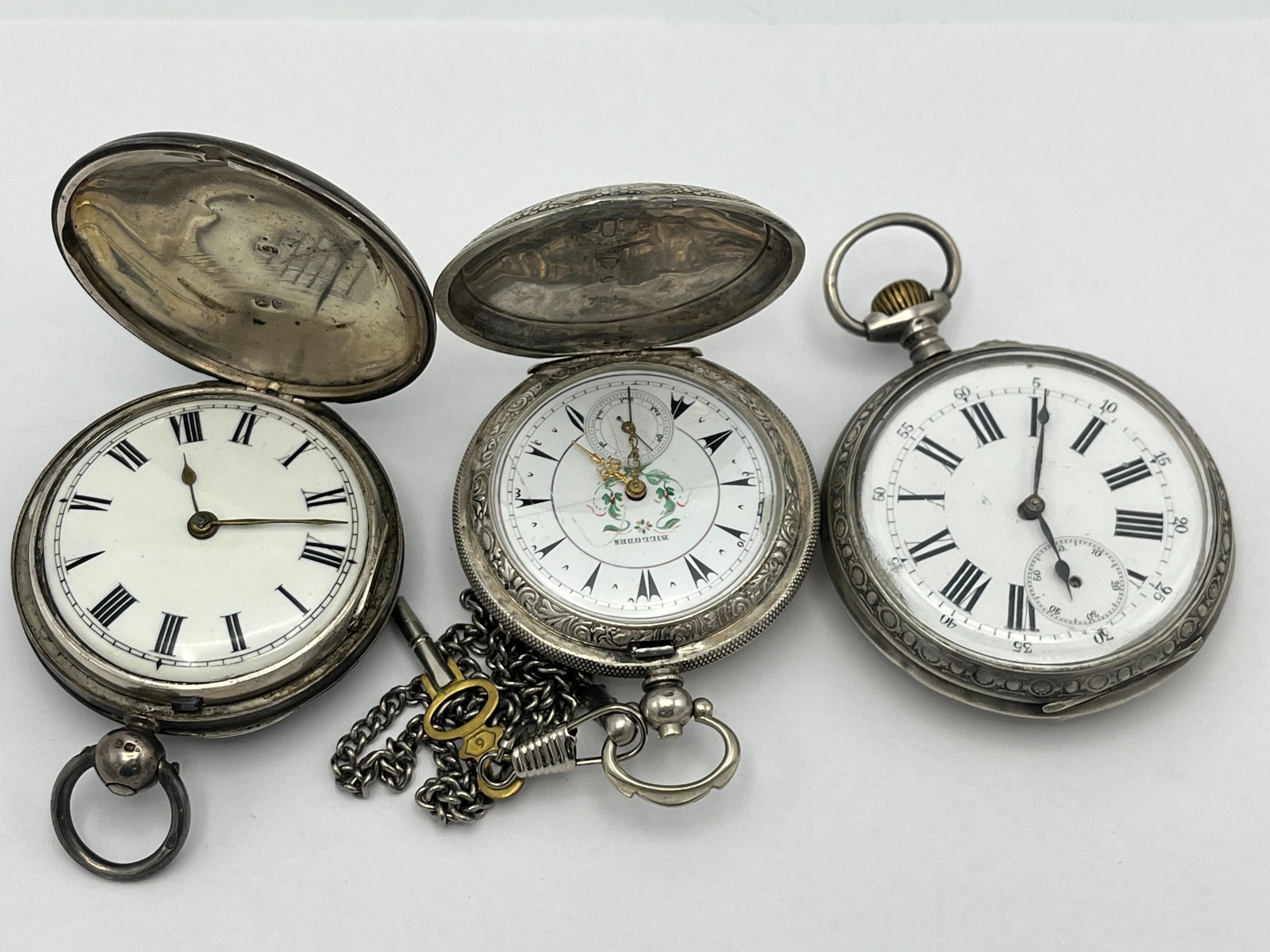 Hopeiset taskukellot - Huutokauppa Ekman