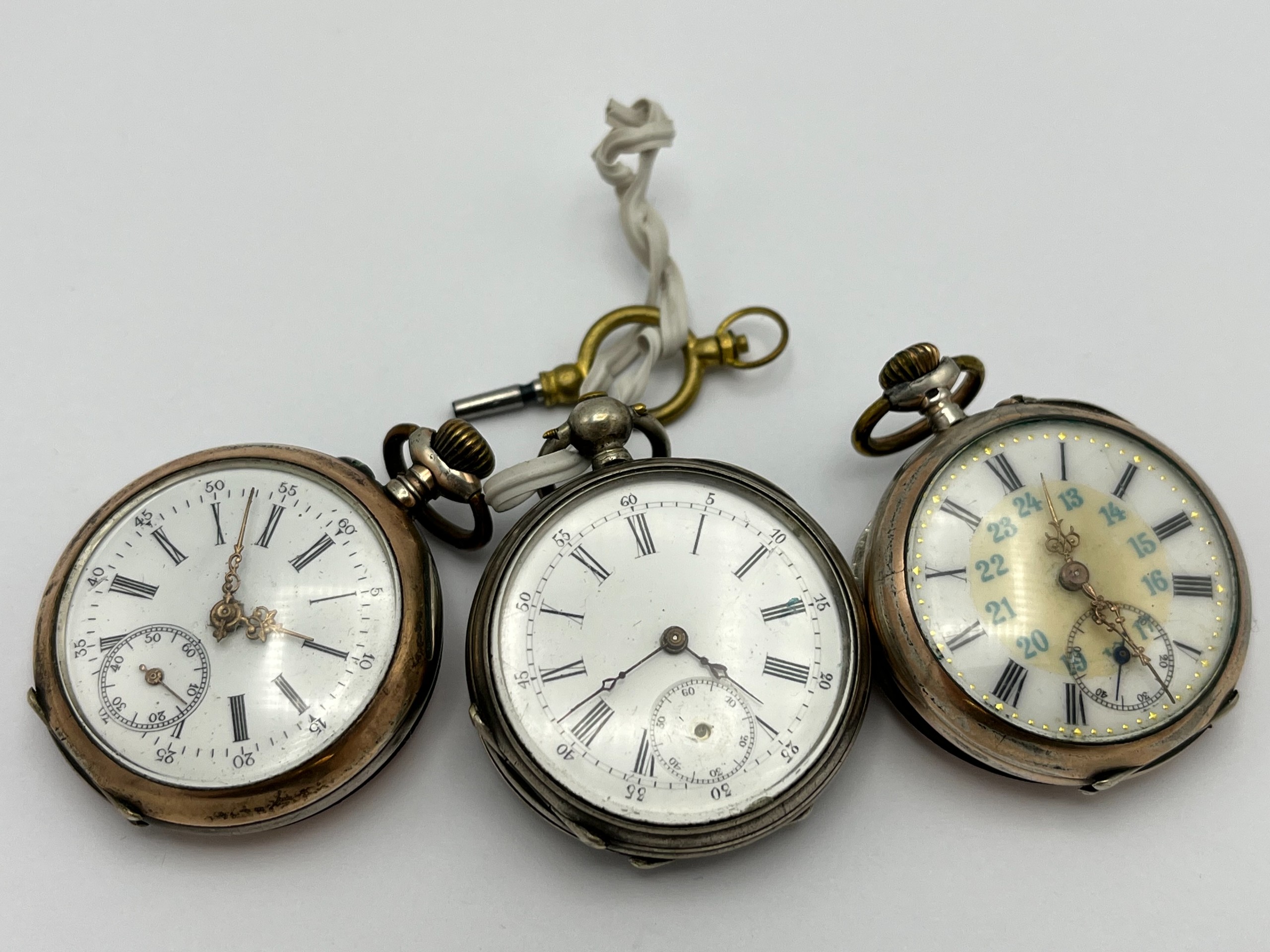 Hopeakuoriset taskukellot - Huutokauppa Ekman