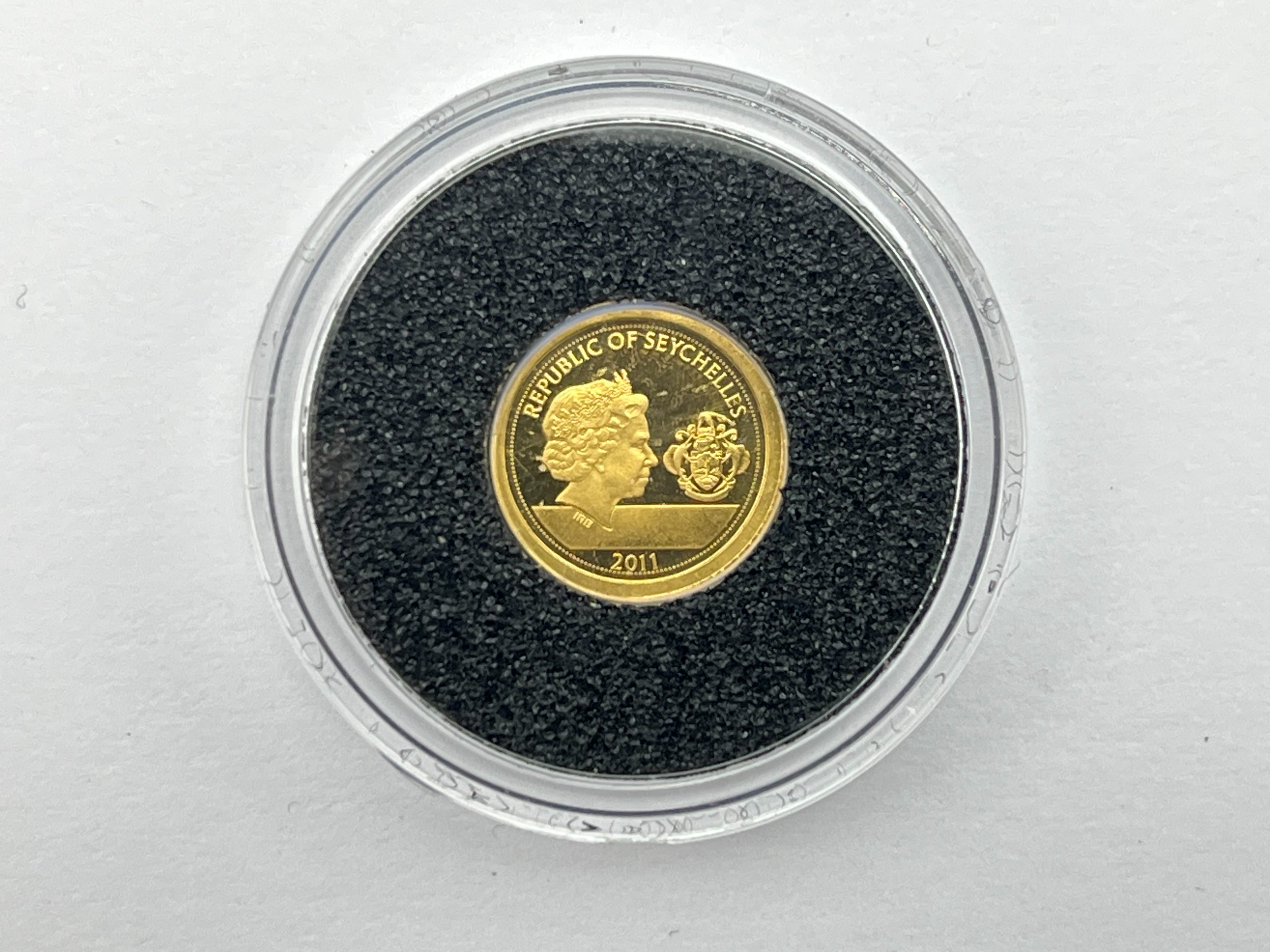 Kultainen kolikko - Huutokauppa Ekman