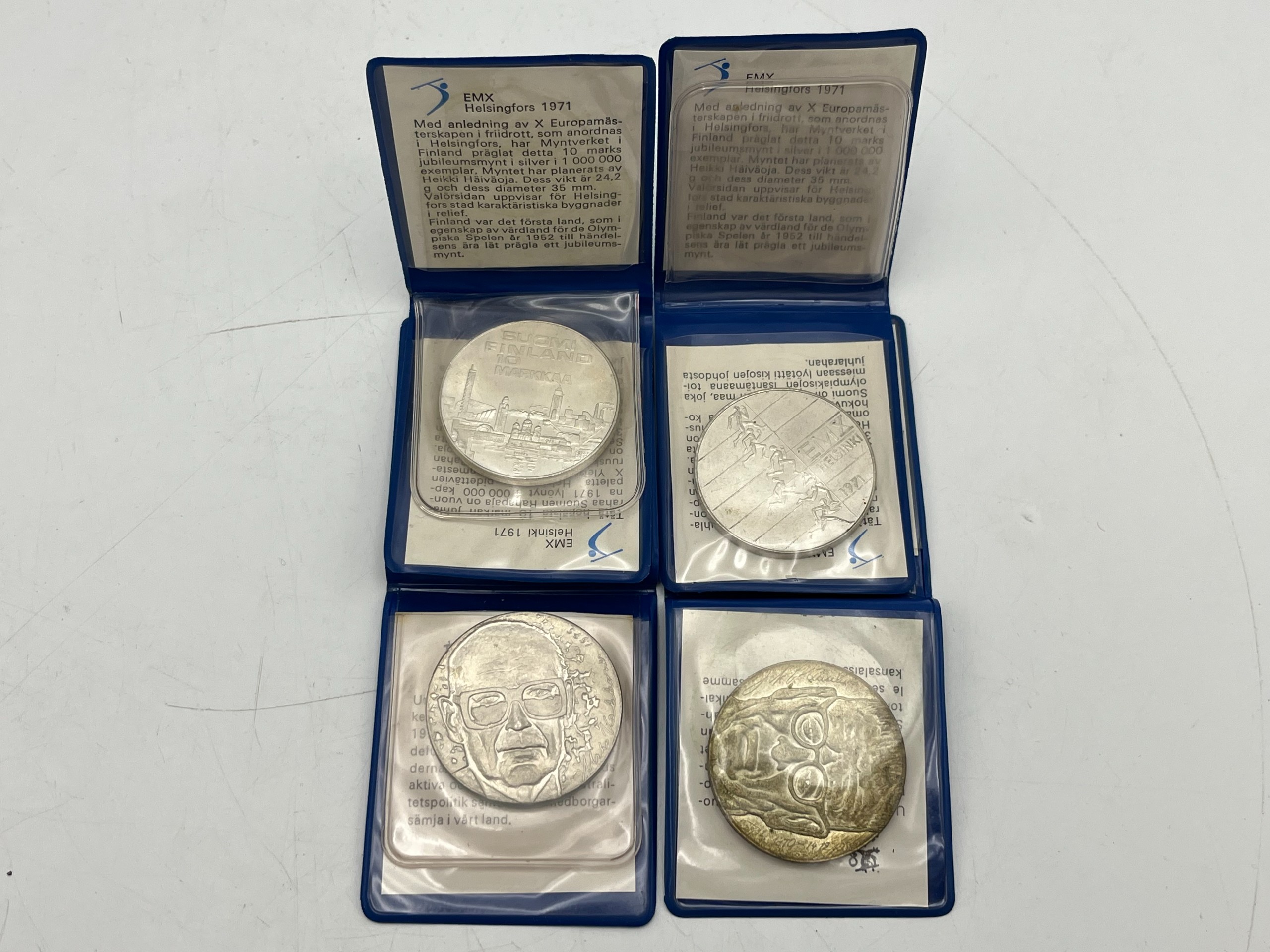 Hopeiset kolikot - Huutokauppa Ekman