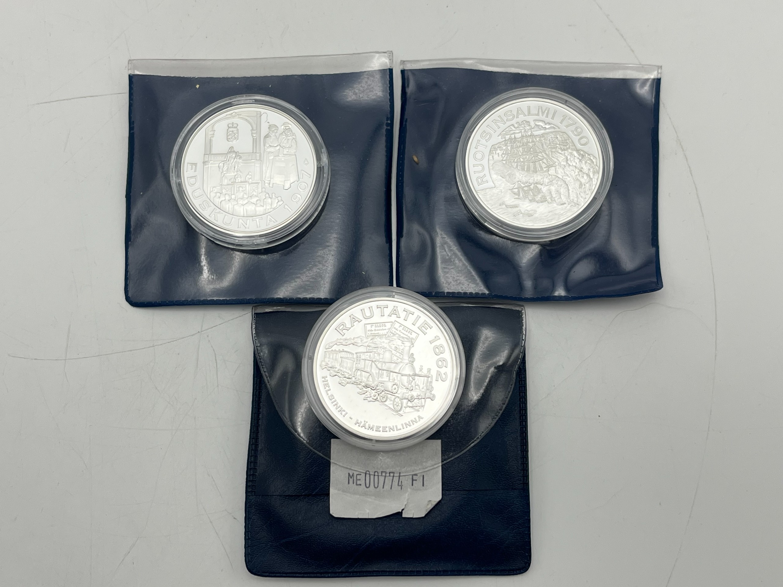 Hopeiset kolikot - Huutokauppa Ekman