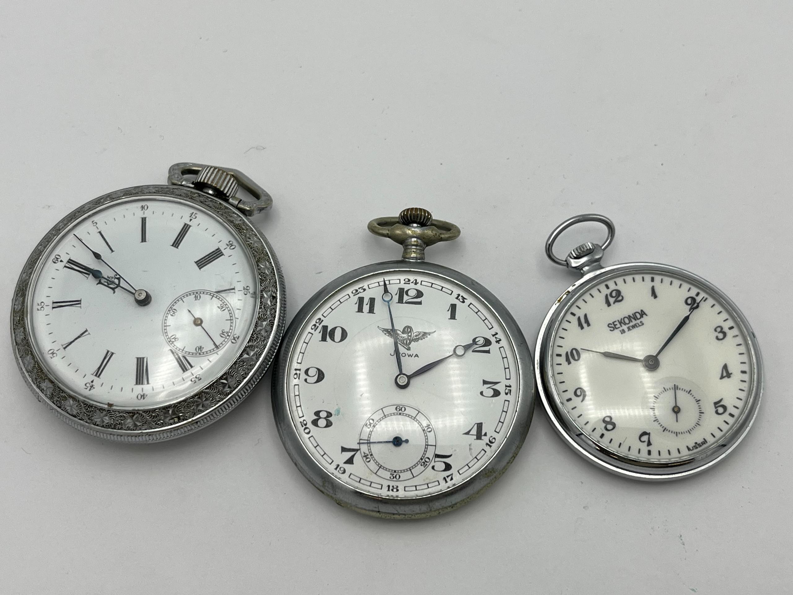 Taskukellot - Huutokauppa Ekman