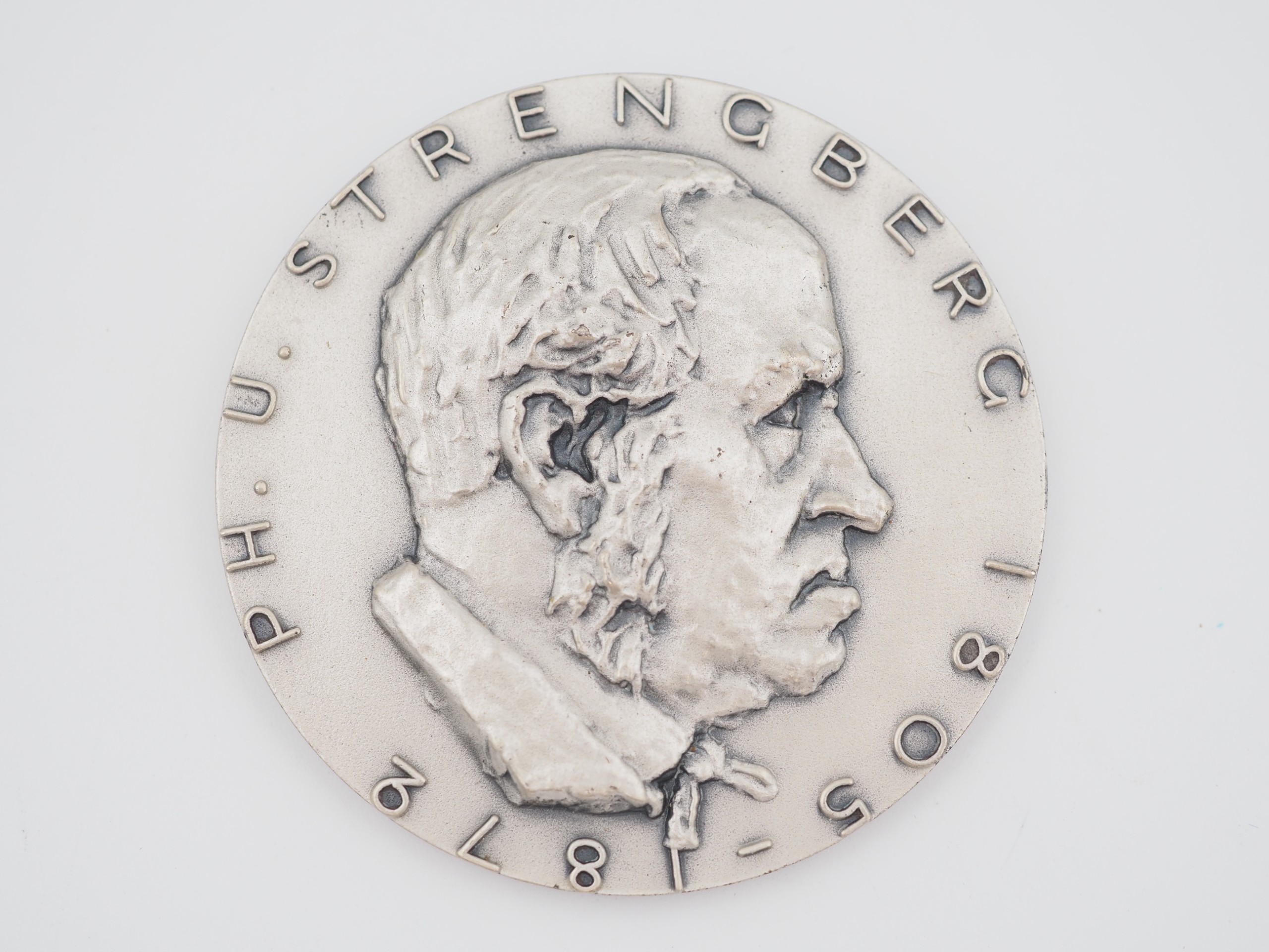 Hopeamitali - Huutokauppa Ekman