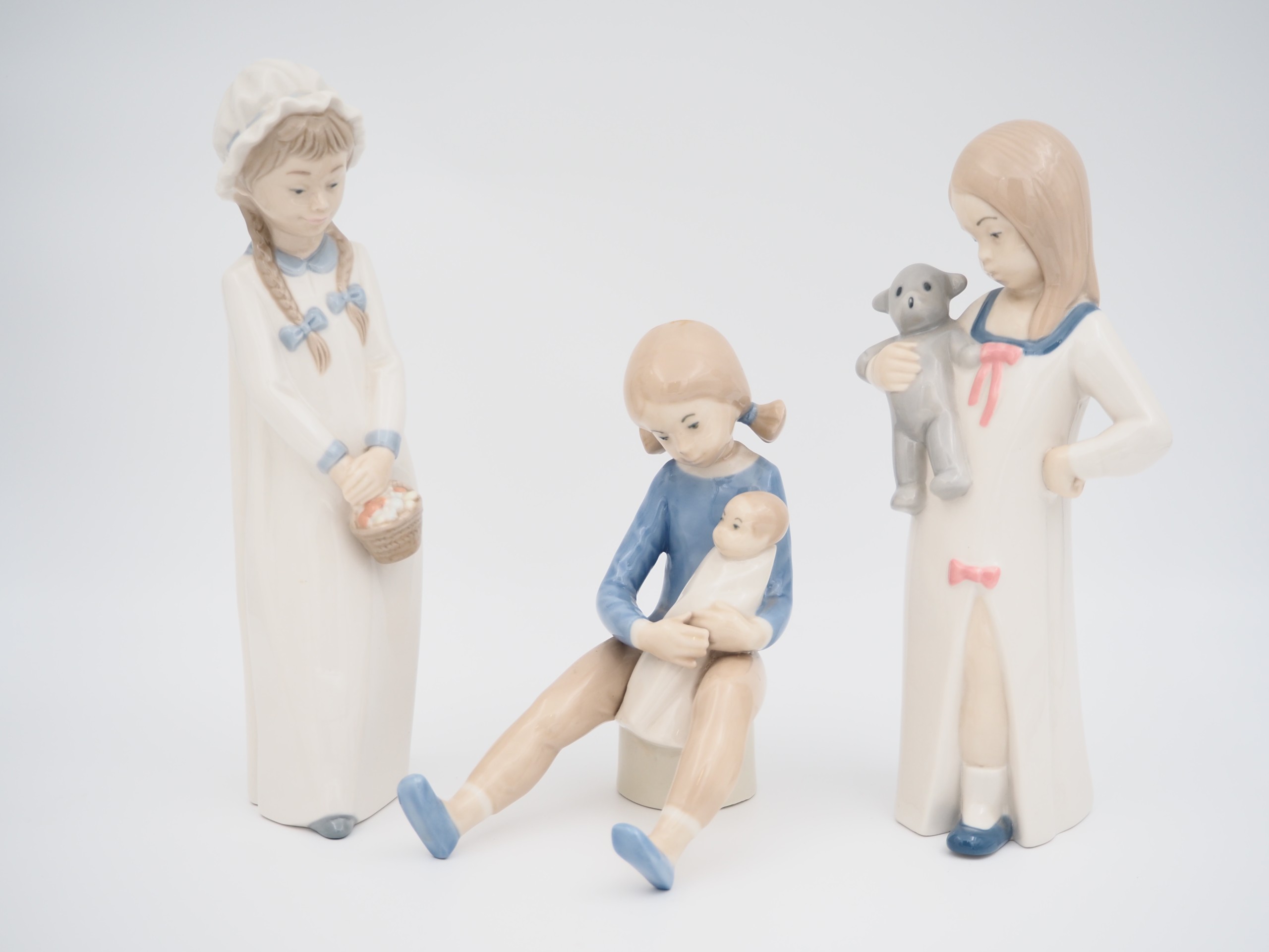 Posliinifiguurit - Huutokauppa Ekman