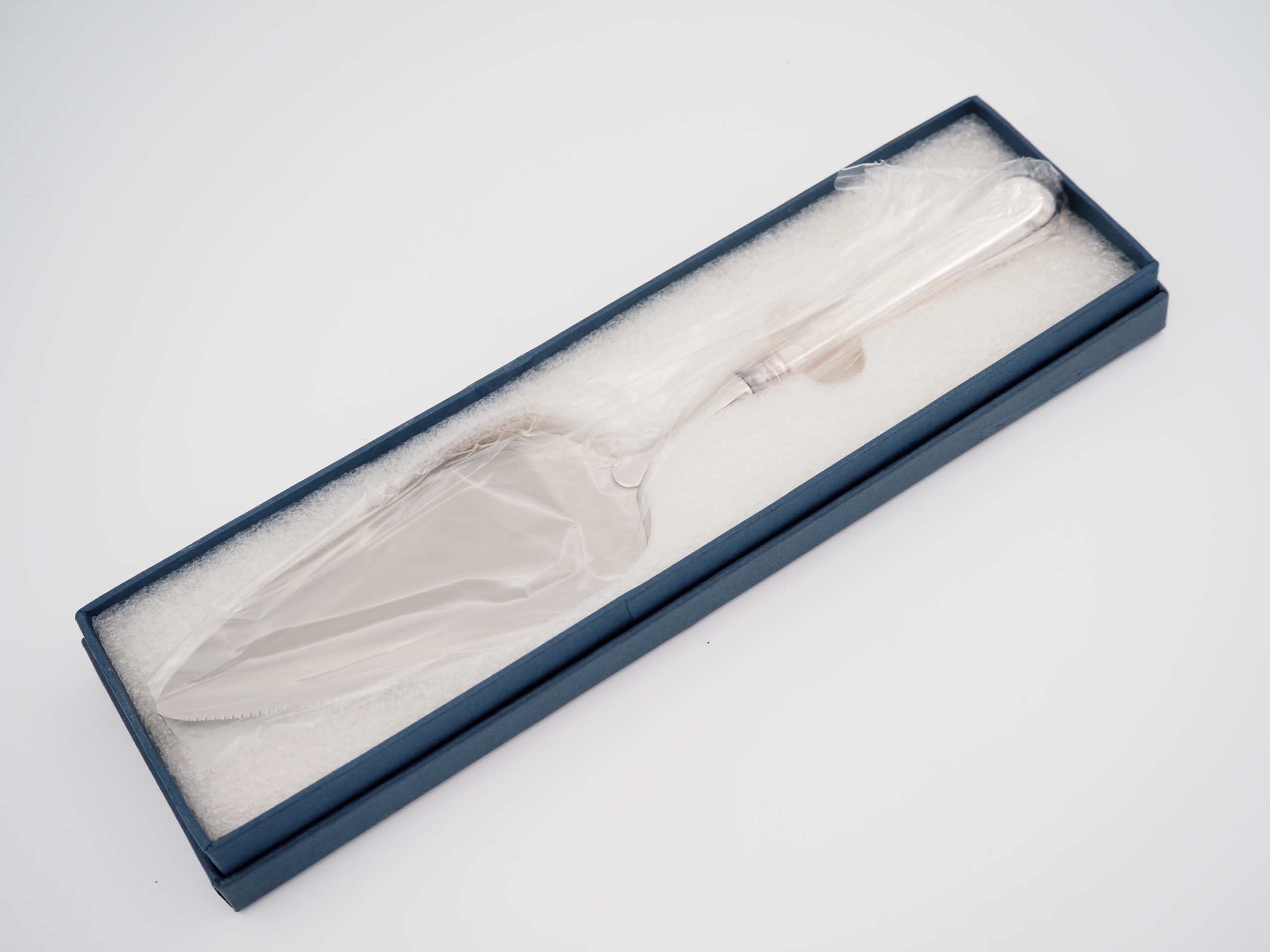 Musla hopeakakkulapio - Huutokauppa Ekman