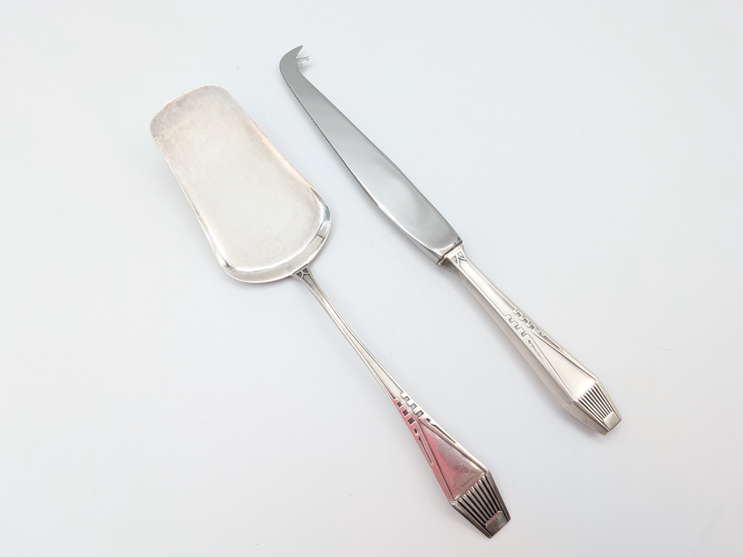 Hopeiset ottimet - Huutokauppa Ekman