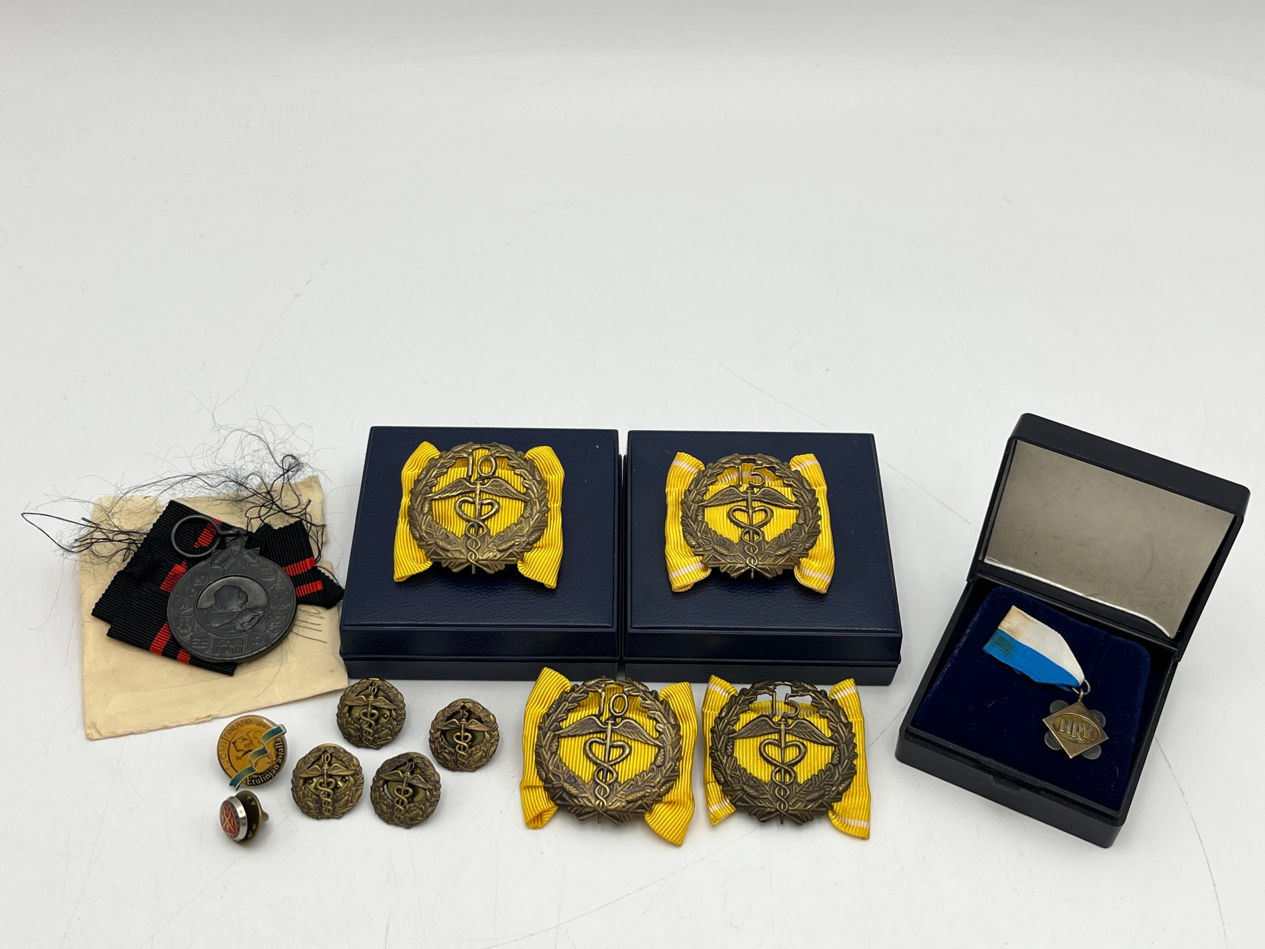 Merkit, mitali - Huutokauppa Ekman