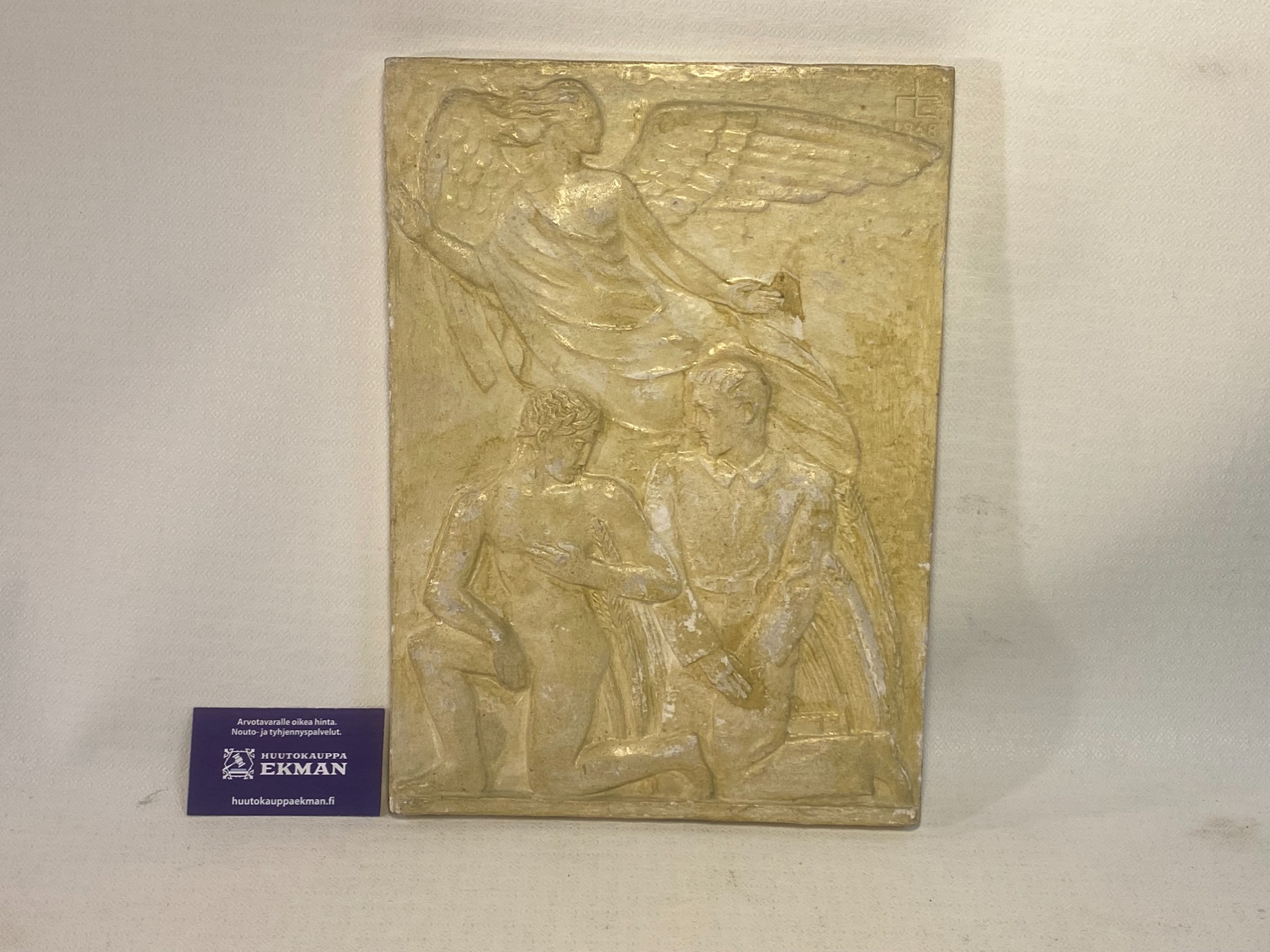 Kipsireliefi - Huutokauppa Ekman