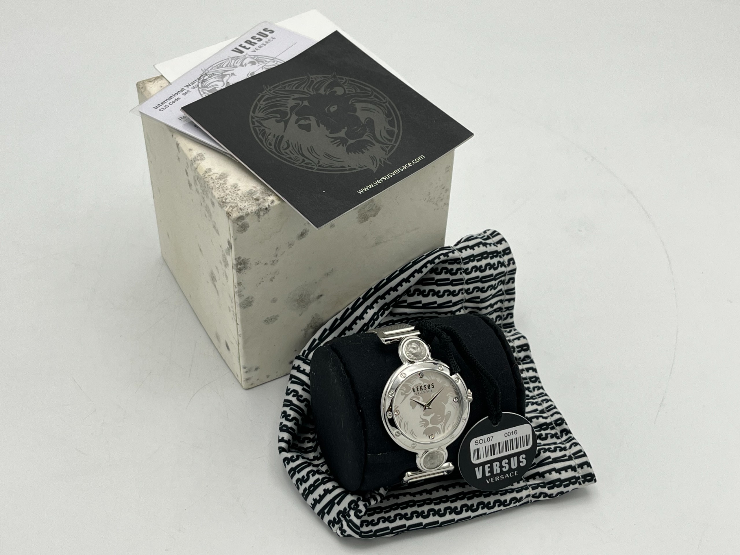 Versus Versace - Huutokauppa Ekman