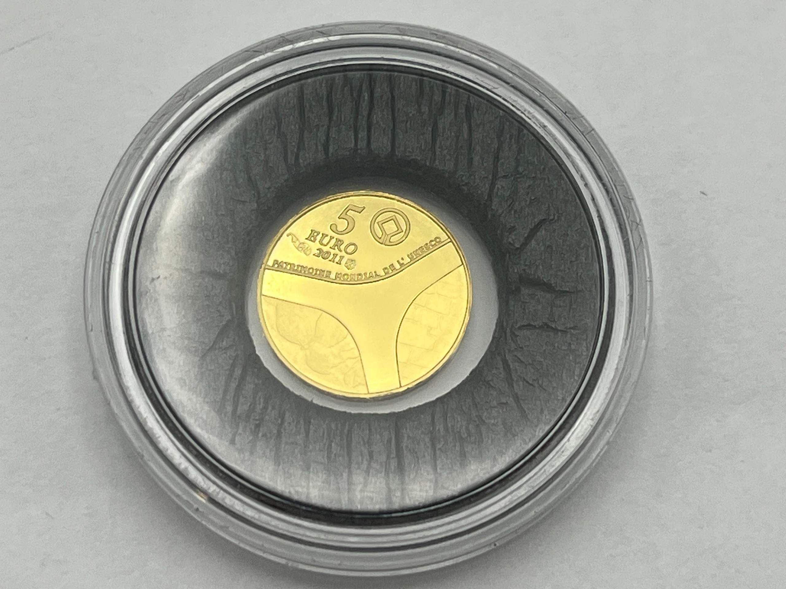 Kultainen kolikko - Huutokauppa Ekman