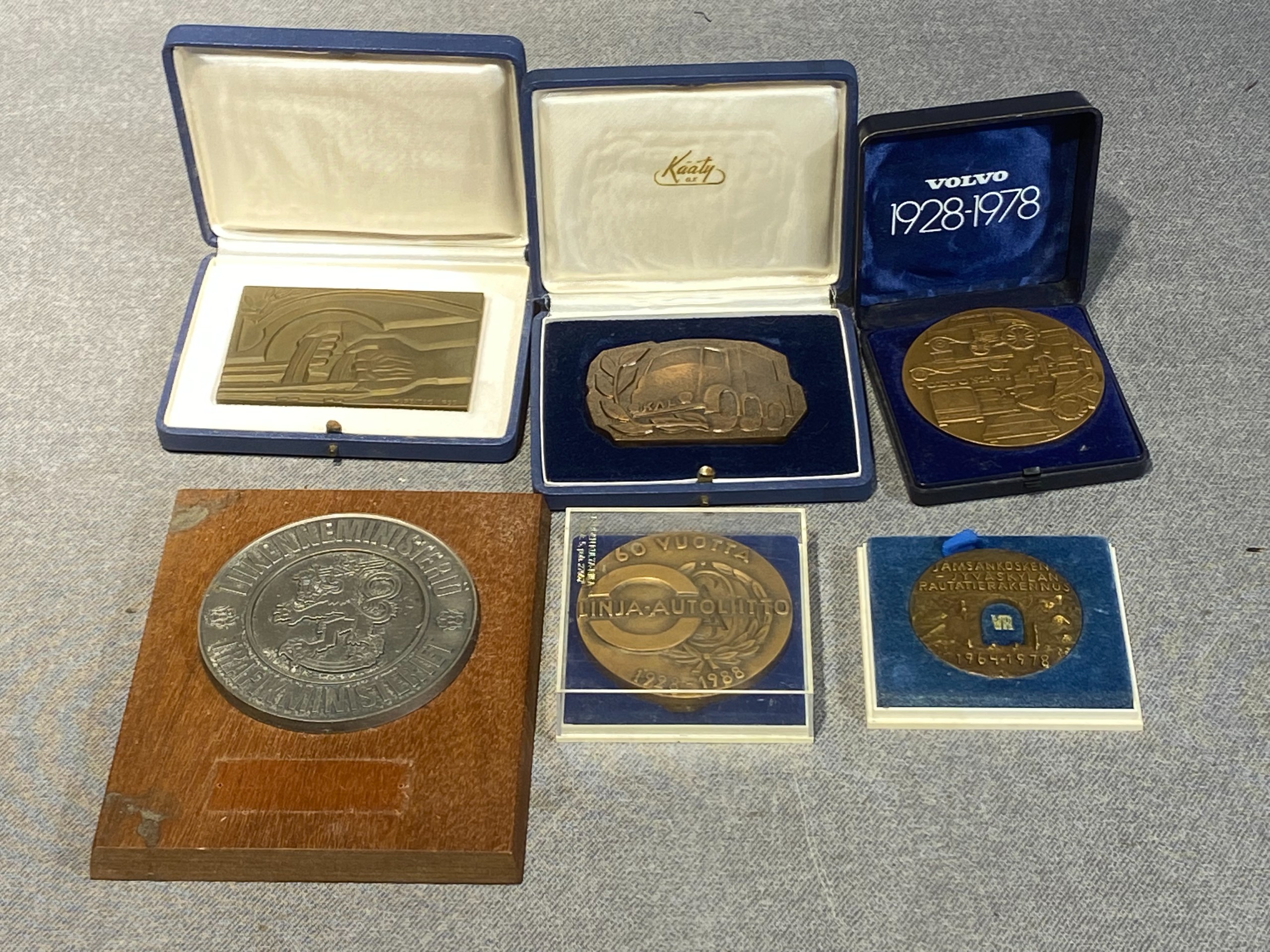 Pöytämitalit - Huutokauppa Ekman