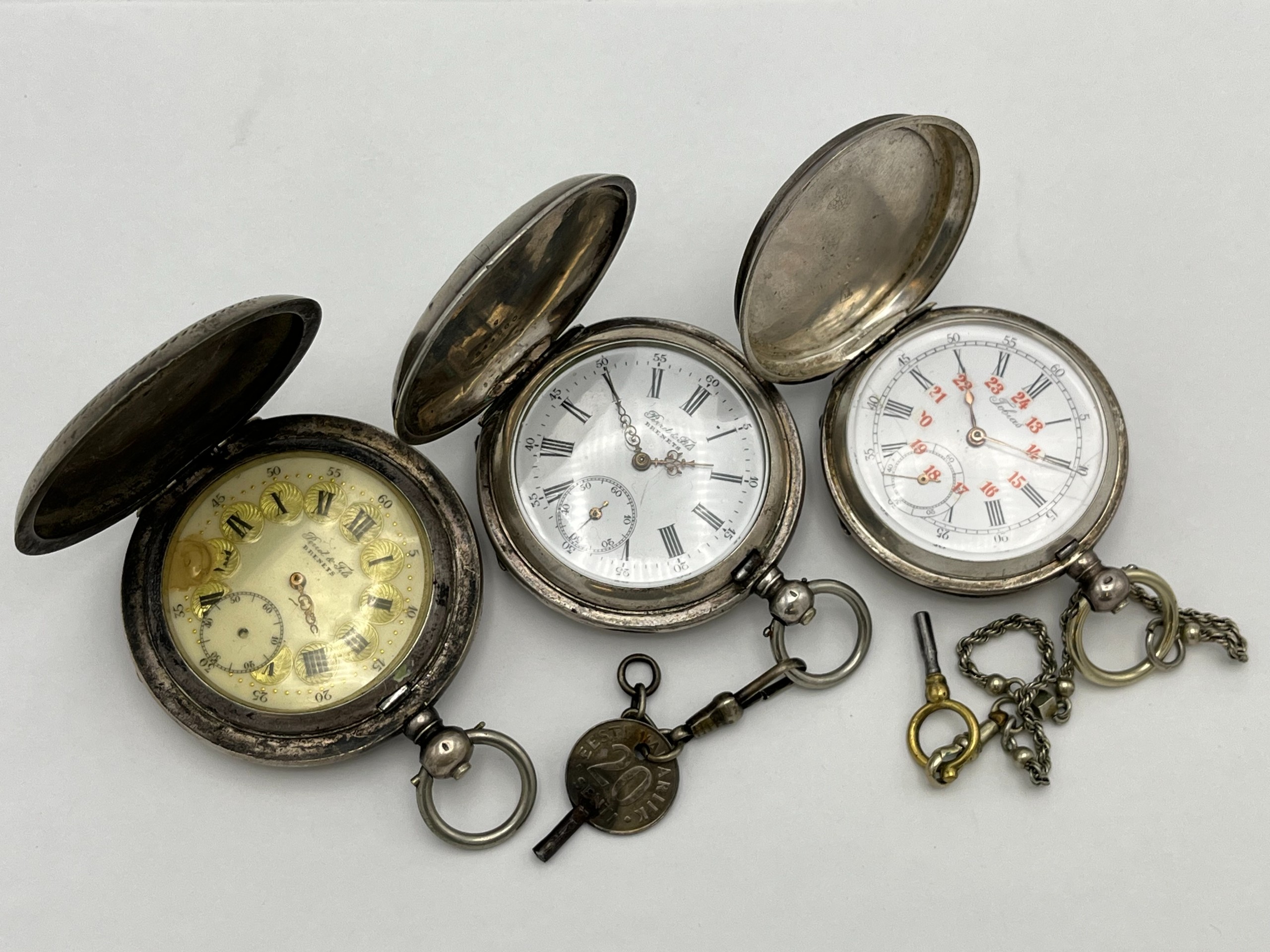 Hopeiset taskukellot - Huutokauppa Ekman