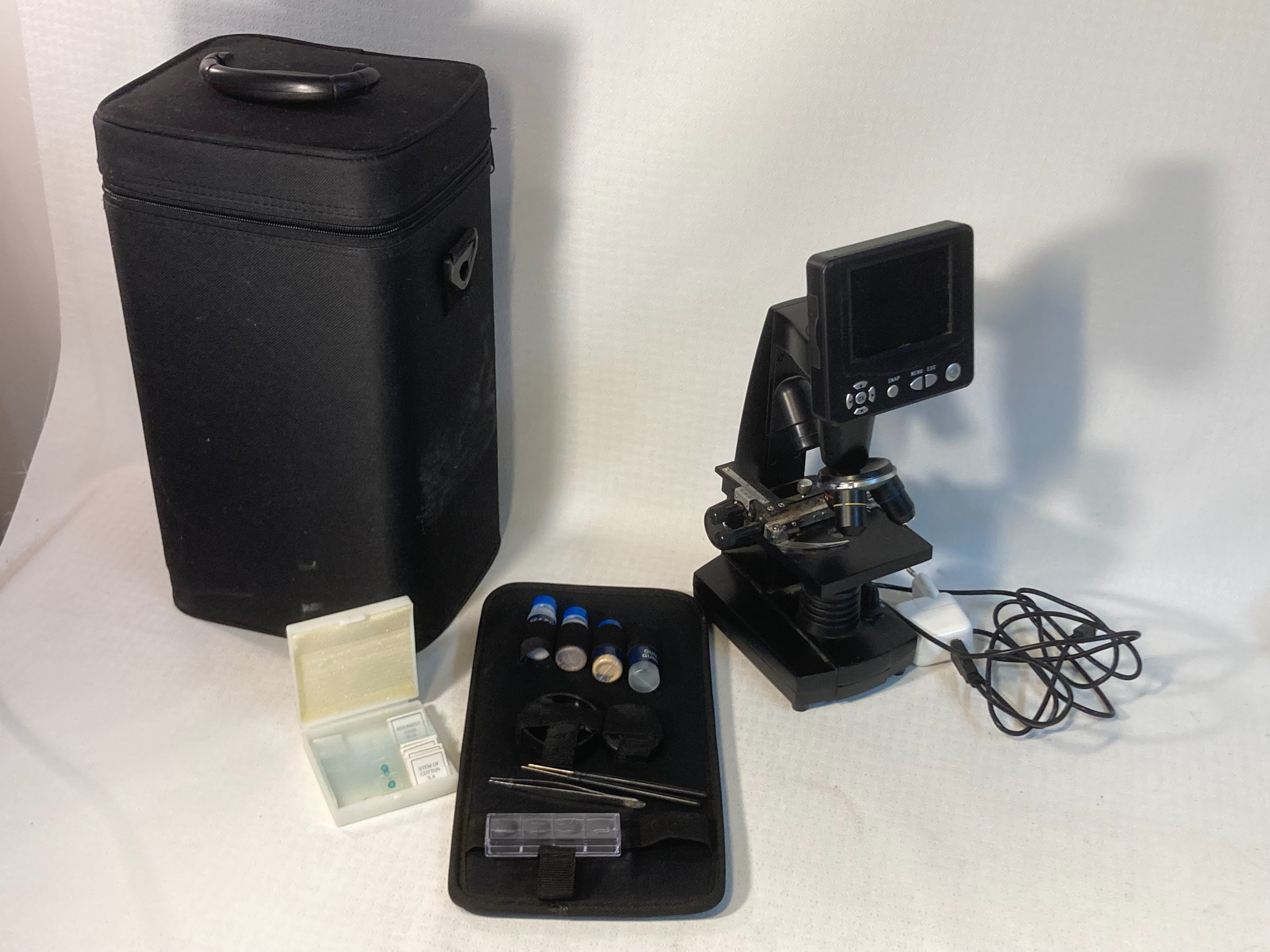 Mikroskooppi - Huutokauppa Ekman