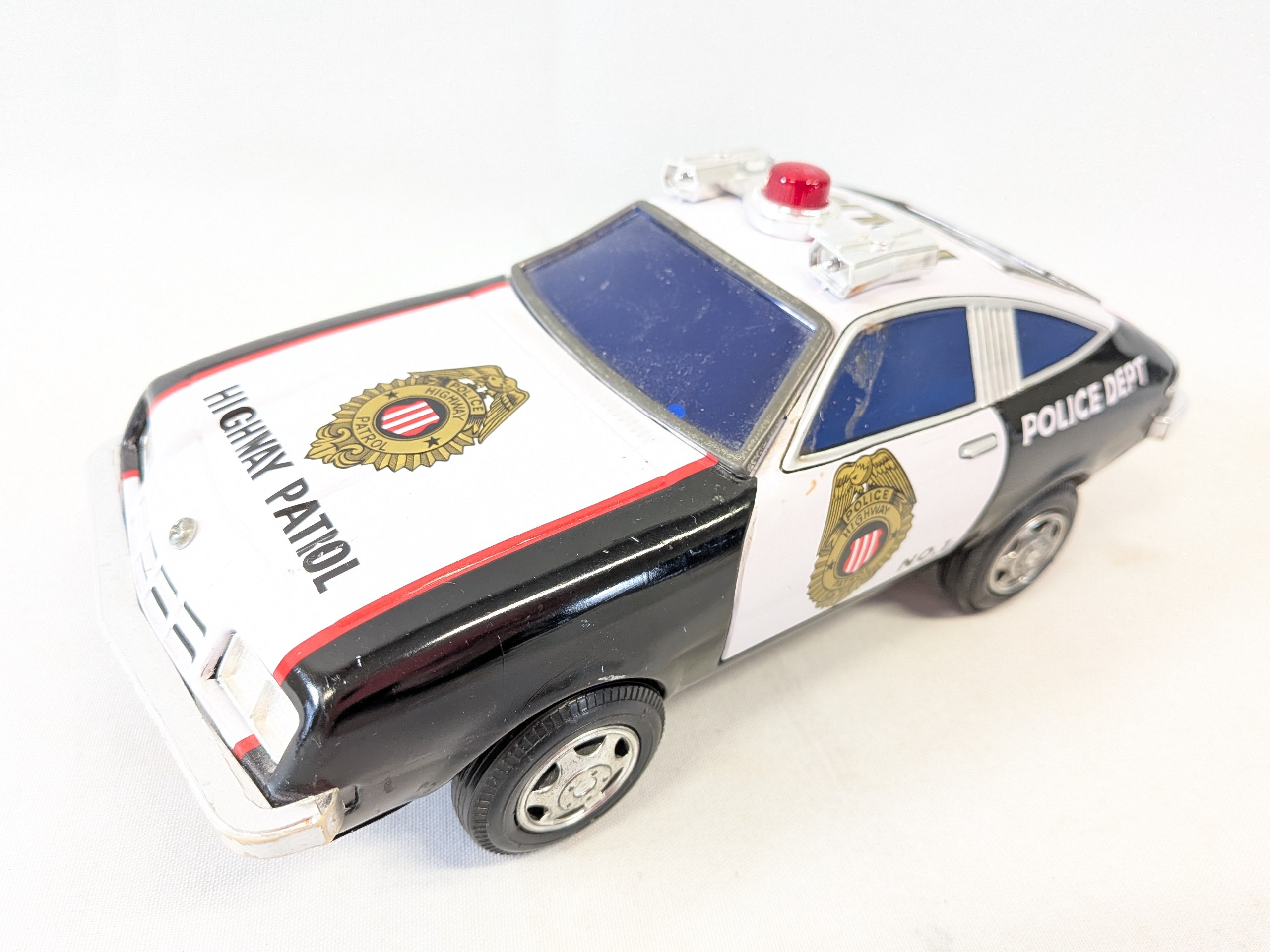 Japanilainen peltiauto - Huutokauppa Ekman