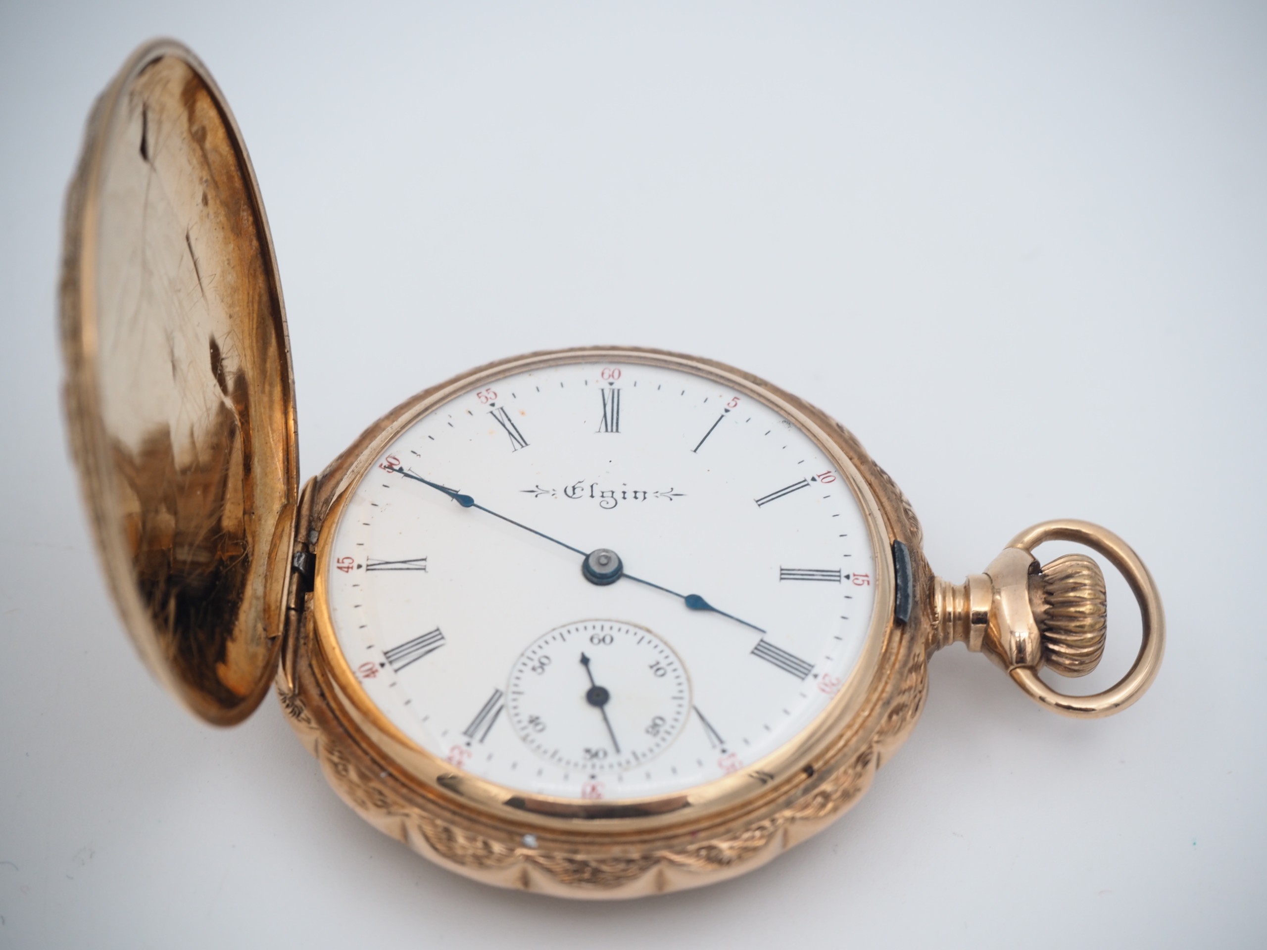 Elgin kultataskukello 14k - Huutokauppa Ekman