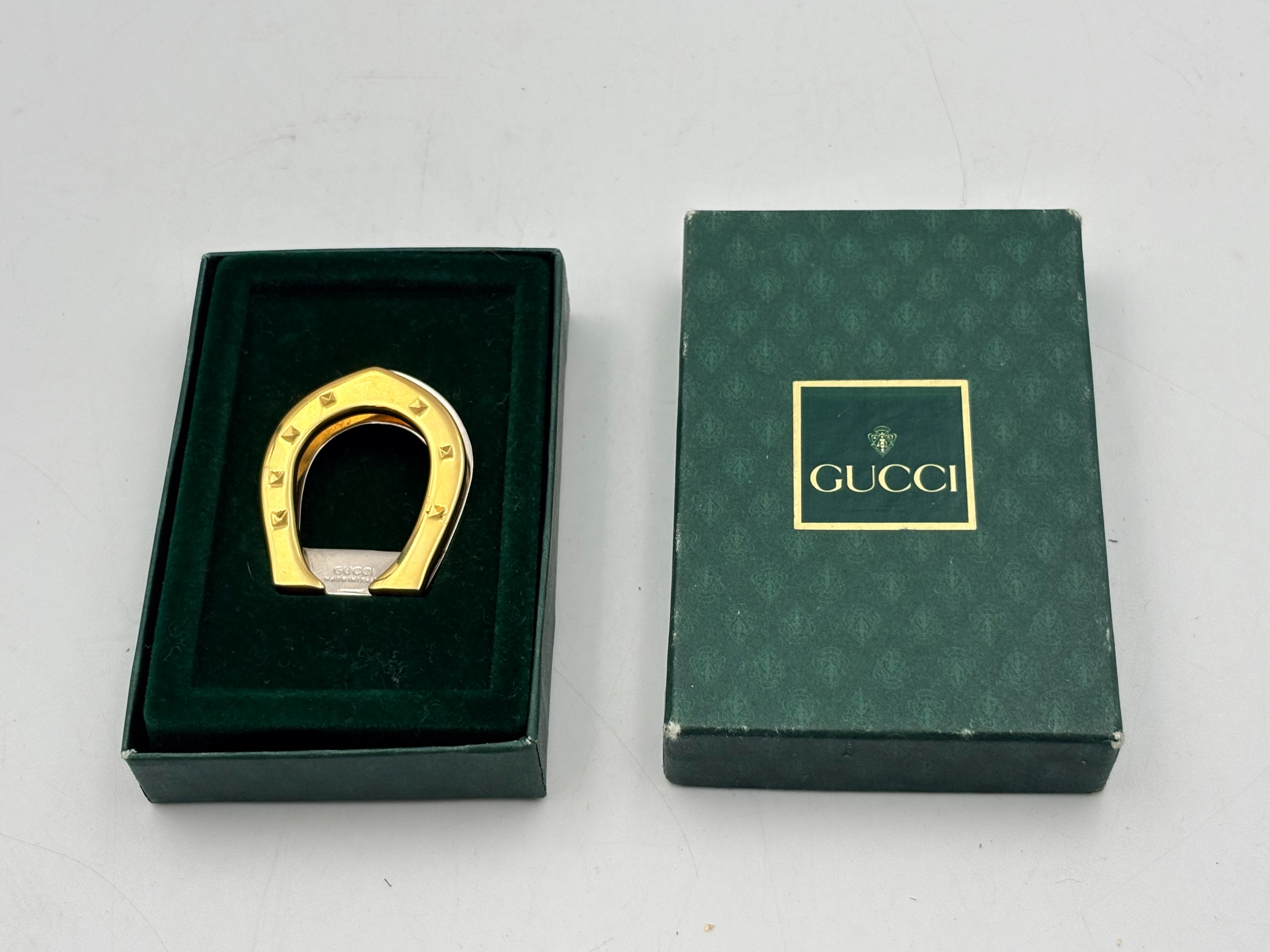 Gucci rahaklipsi - Huutokauppa Ekman
