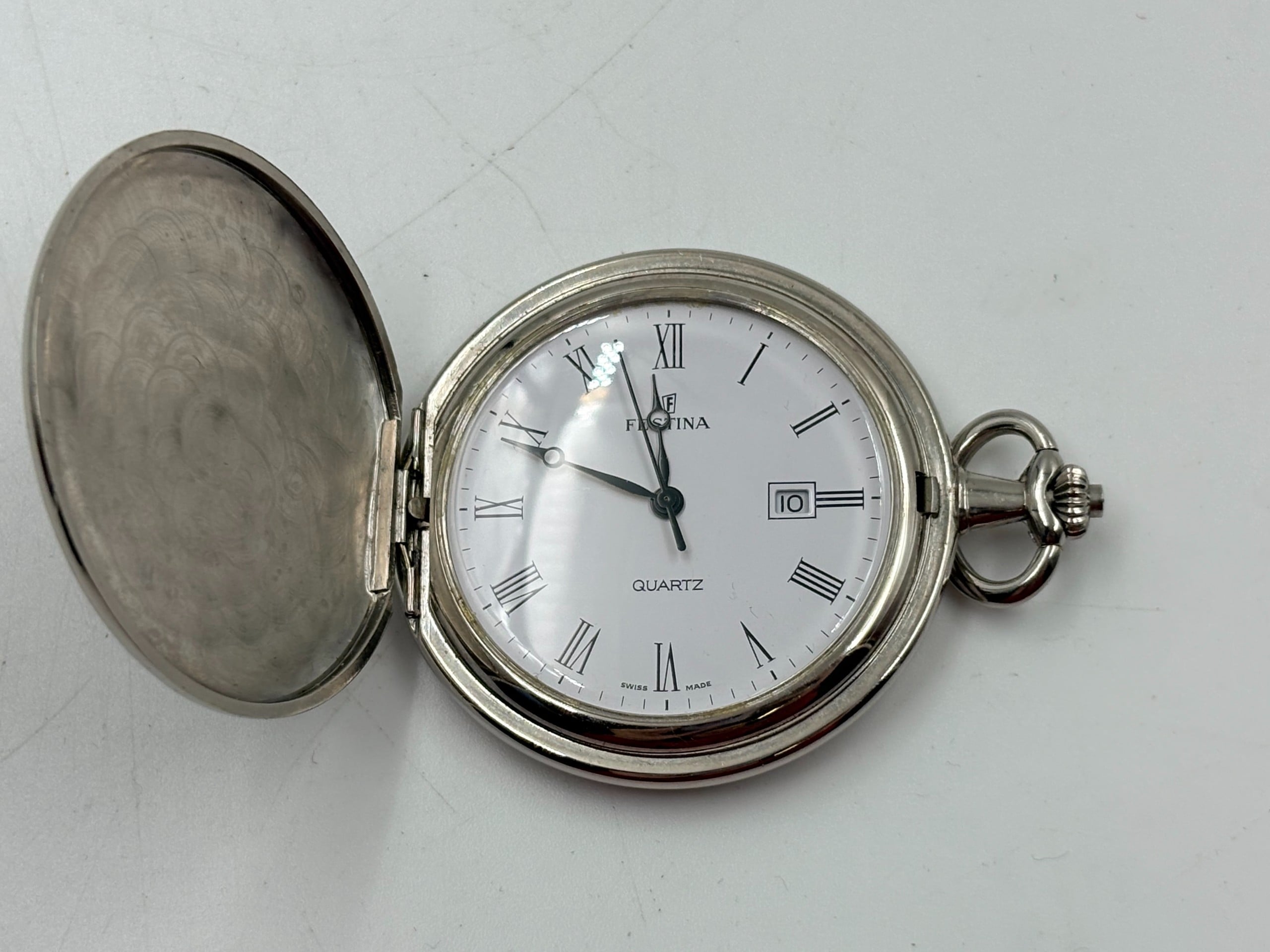 Festina - Huutokauppa Ekman
