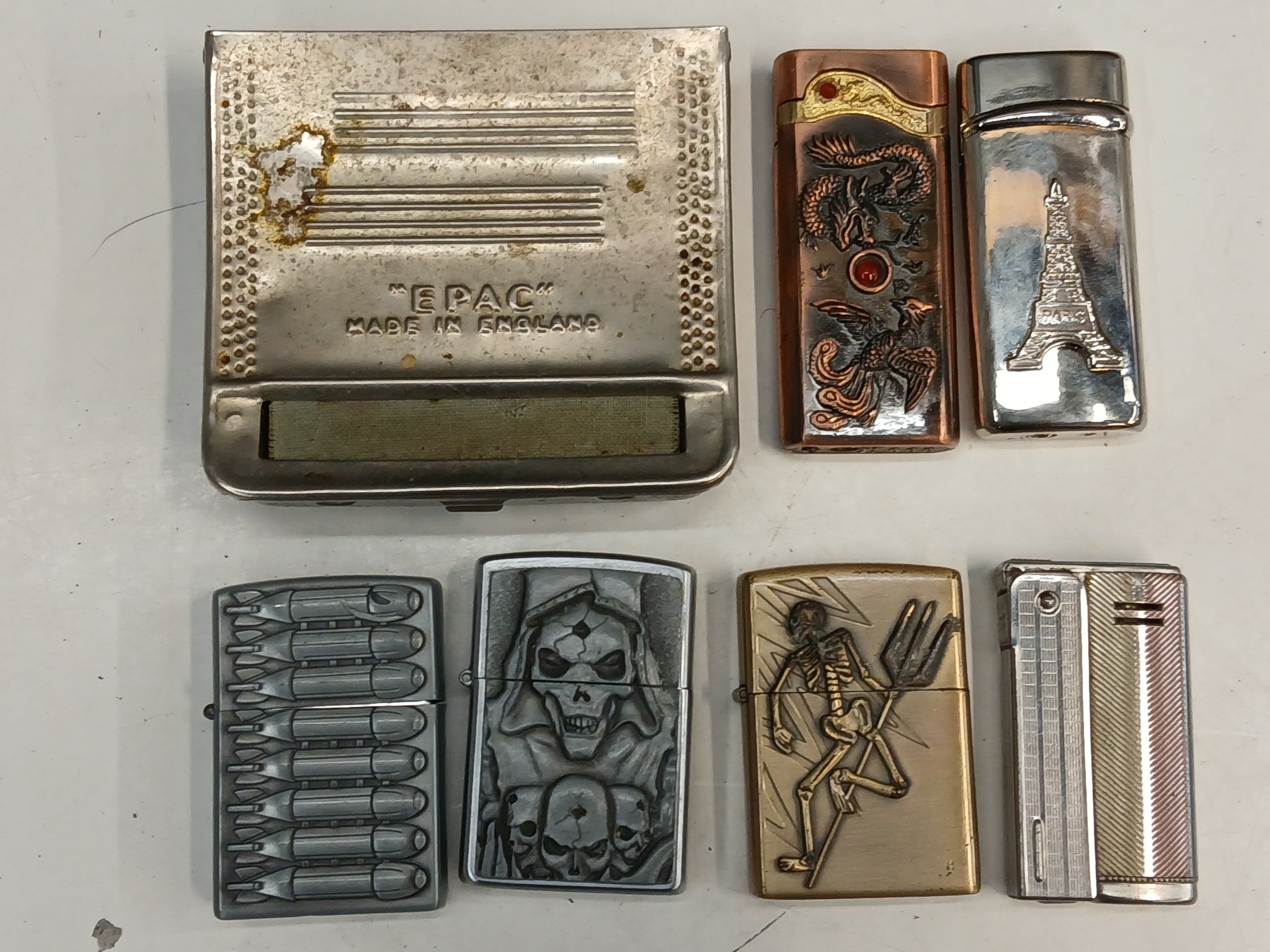 Zippo- sytyttimet ym. - Huutokauppa Ekman